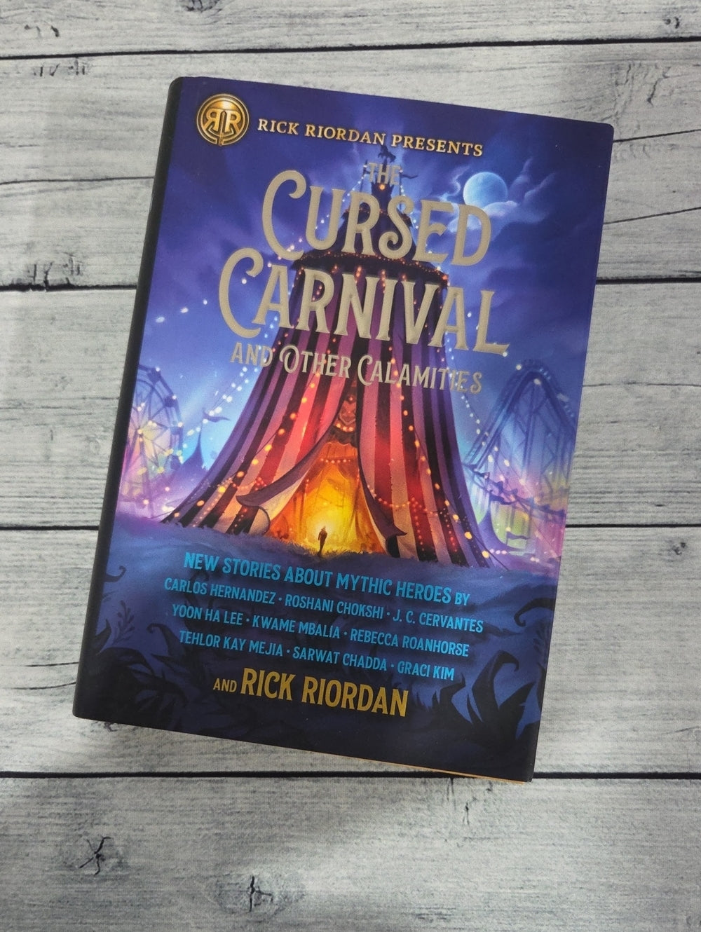 Rick Riordan Presents The Cursed Carnival and Other Calamities Hardcover